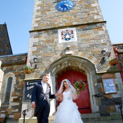 Launceston Town Hall, Cornwall. Suit by David Parish Menswear, Dress and veil from Lowen Bridal, Flowers by Flower Scene, MUA, Abi Scott, Bridal Hair by Hush. June.
